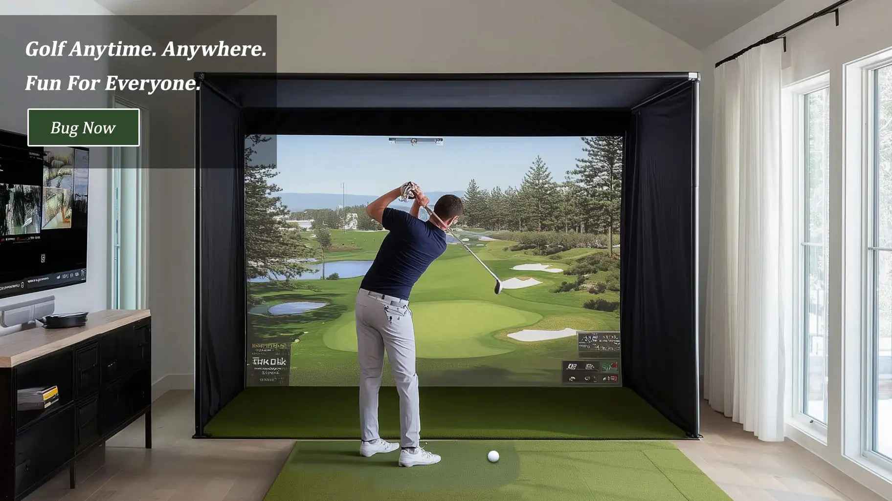 Indoor golf simulator in a modern living room with a person swinging a golf club.